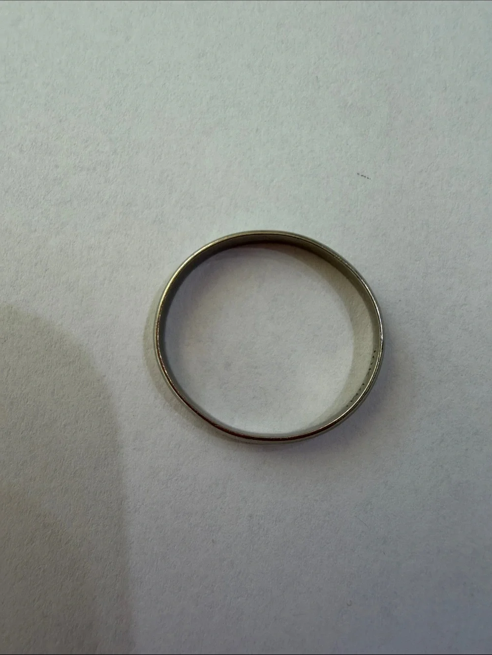white Gold  stamped 10k( slightly bent))size 9 1/2